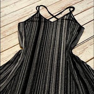 Very light weight crepe fabric criss cross dressy tank brand new.